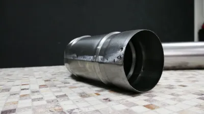Труба угловая Ø70 для дровяной печи